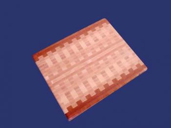 A Maple Cherry end grain cutting board